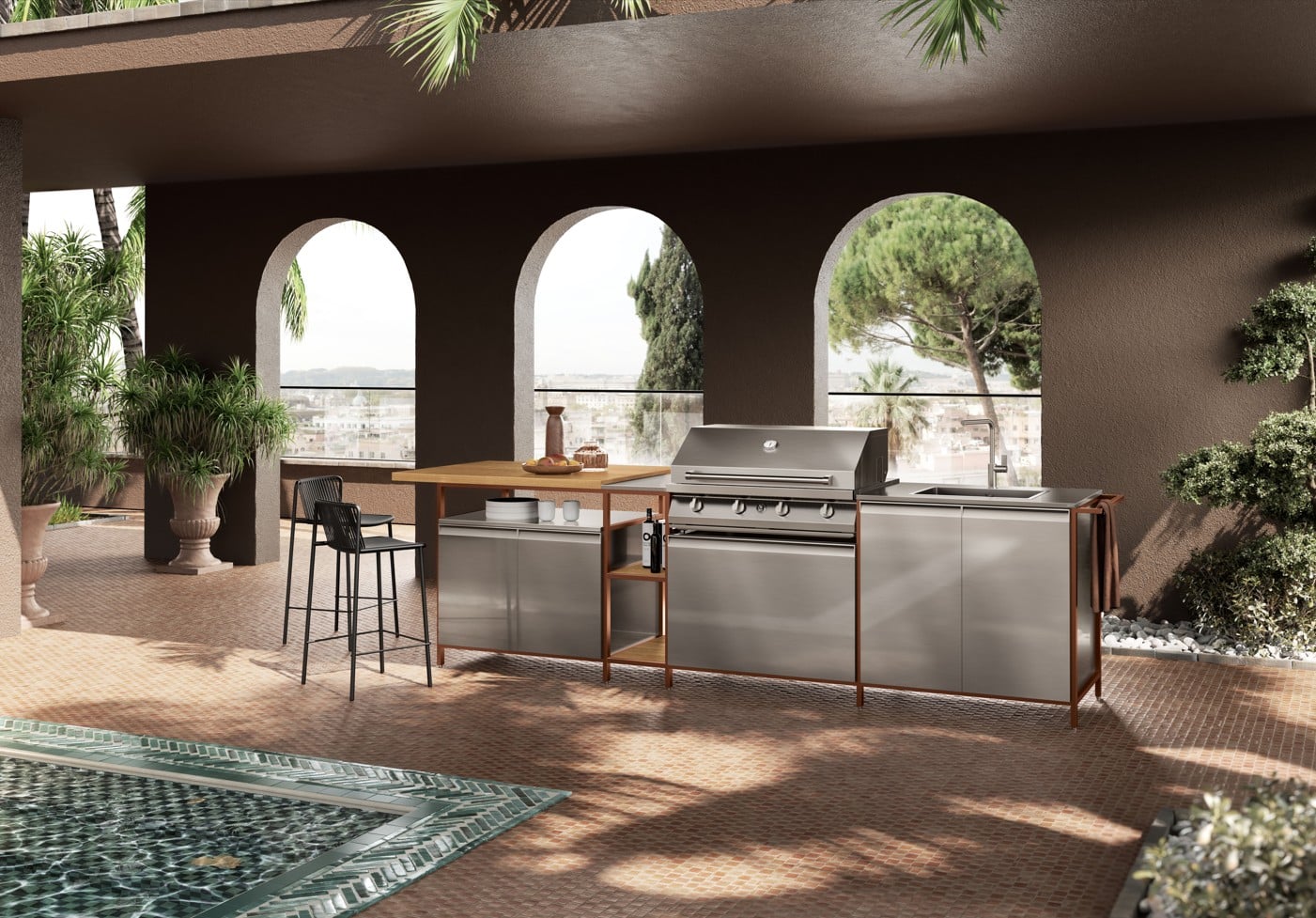 Tyylikäs ulkokeittiö uima-altaan vieressä